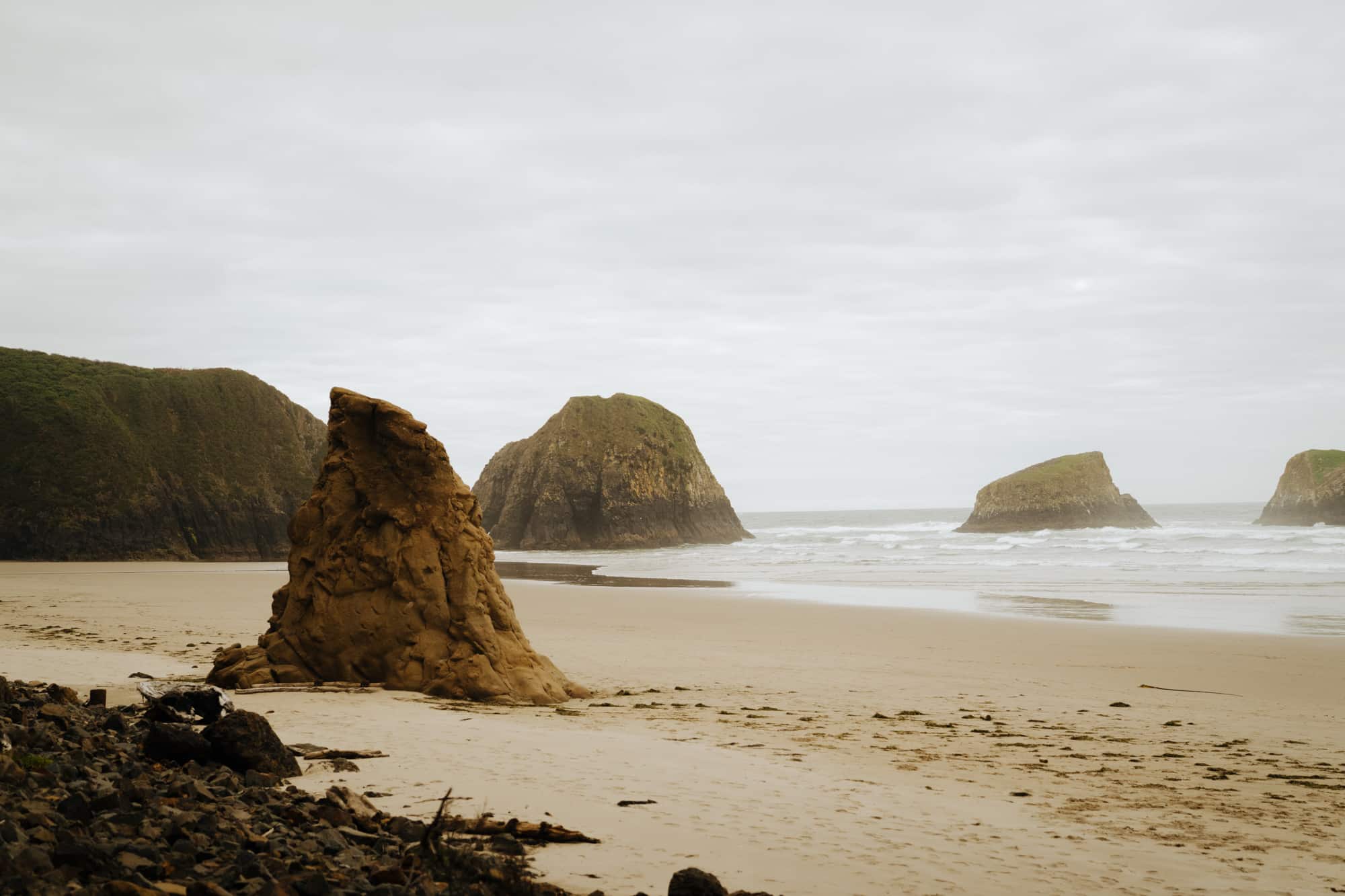 Sea stacks and rock formations at Crescent beach in Ecola State Park in Oregon.