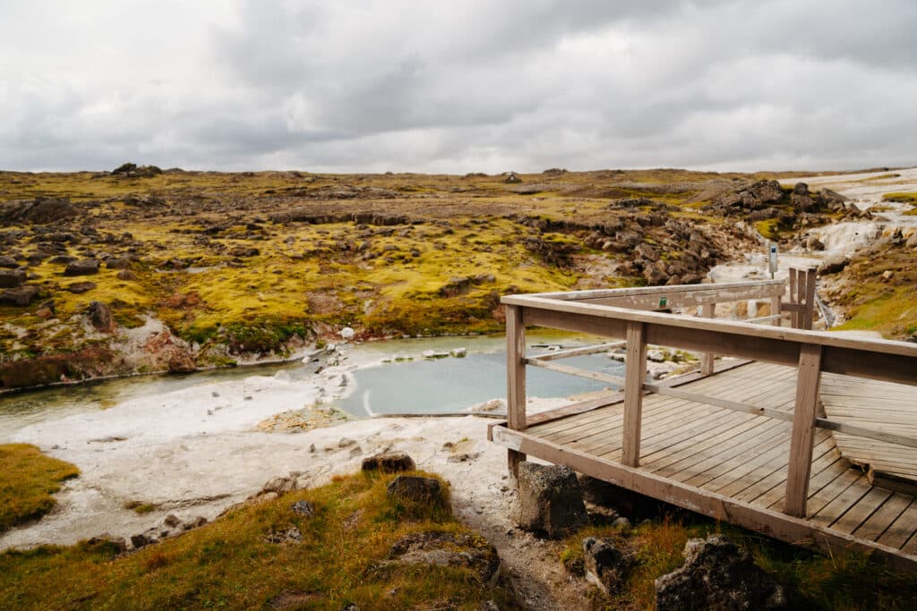 A view of Hveravellir Hot Spring and the surrounding landscape.