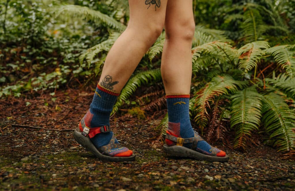 Me wearing Darn Tough socks with Chaco sandals, either of which would make an amazing gift for outdoorsy women.
